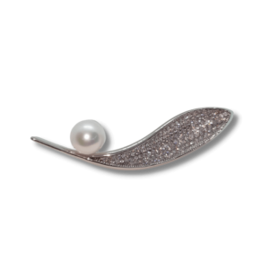 single pearl sitting on a silver leaf desiign brooch